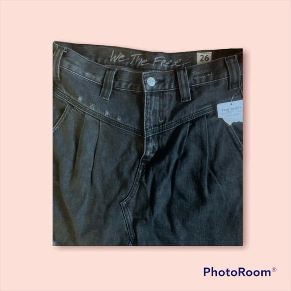 This is a a we the free mini denim skirt in sanded black color - Picture 2 of 3